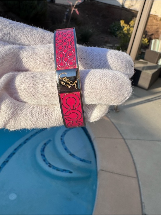 Jewelry - Coach hot pink bangle bracelet 7 1/2